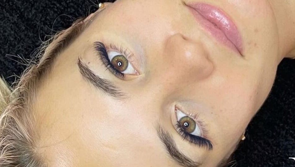 Close-up of enhanced eyelashes at Beauty Additions, Sandton, Gauteng, ZA, showcasing luxury beauty services.