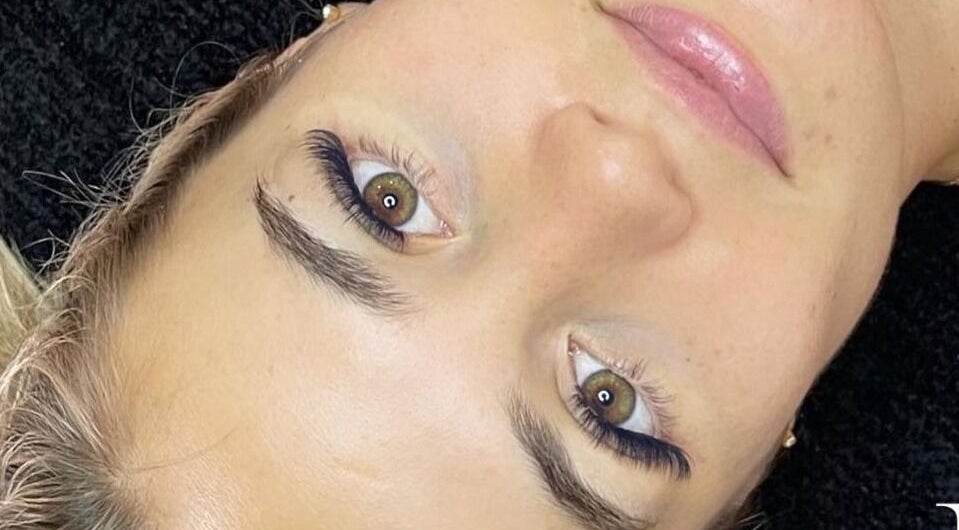 Close-up of enhanced eyelashes at Beauty Additions, Sandton, Gauteng, ZA, showcasing luxury beauty services.