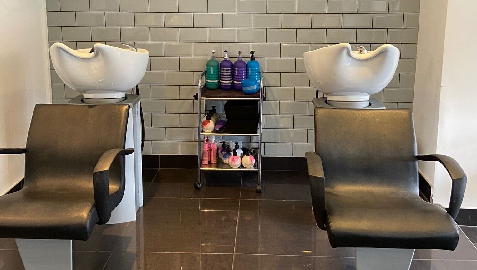 Modern wash stations at Capellis Birmingham Ltd in Birmingham, England, GB exude elegance and comfort.