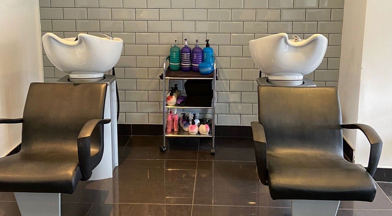 Modern wash stations at Capellis Birmingham Ltd in Birmingham, England, GB exude elegance and comfort.