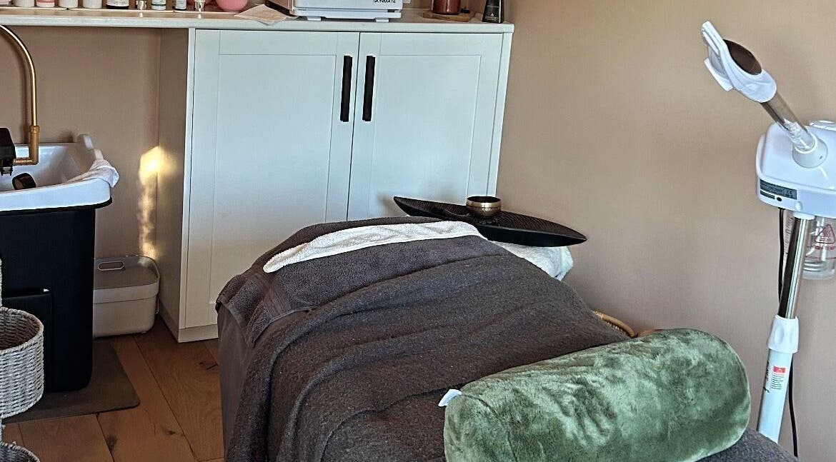 Tranquil treatment room with plush bed at Salon Megan’s, Surrey, England, GB for ultimate wellness experience.