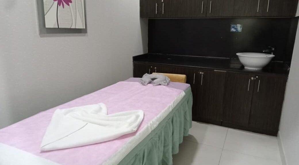 Massage room at Body Sky Massage & Spa JLT - Cluster W, Dubai, AE, featuring a comfortable bed and tranquil decor.