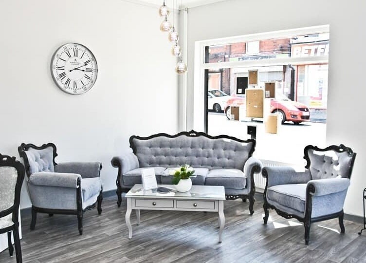 Cozy lounge area with vintage sofas at Innovation in Saint Helens, England, GB, perfect for relaxation.