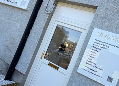 Front entrance of Dolly Rocks Hair & Beauty in Gorseinon, Wales, GB showcasing services offered.