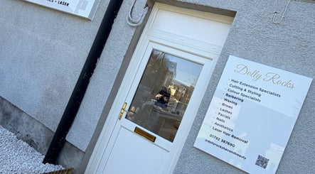 Front entrance of Dolly Rocks Hair & Beauty in Gorseinon, Wales, GB showcasing services offered.