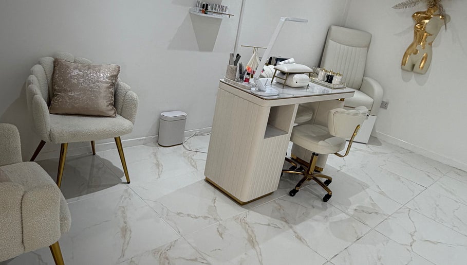 Luxurious nail station at Dolly Rocks Beauty, Aesthetics & Laser, Gorseinon, Wales, GB with plush seating.