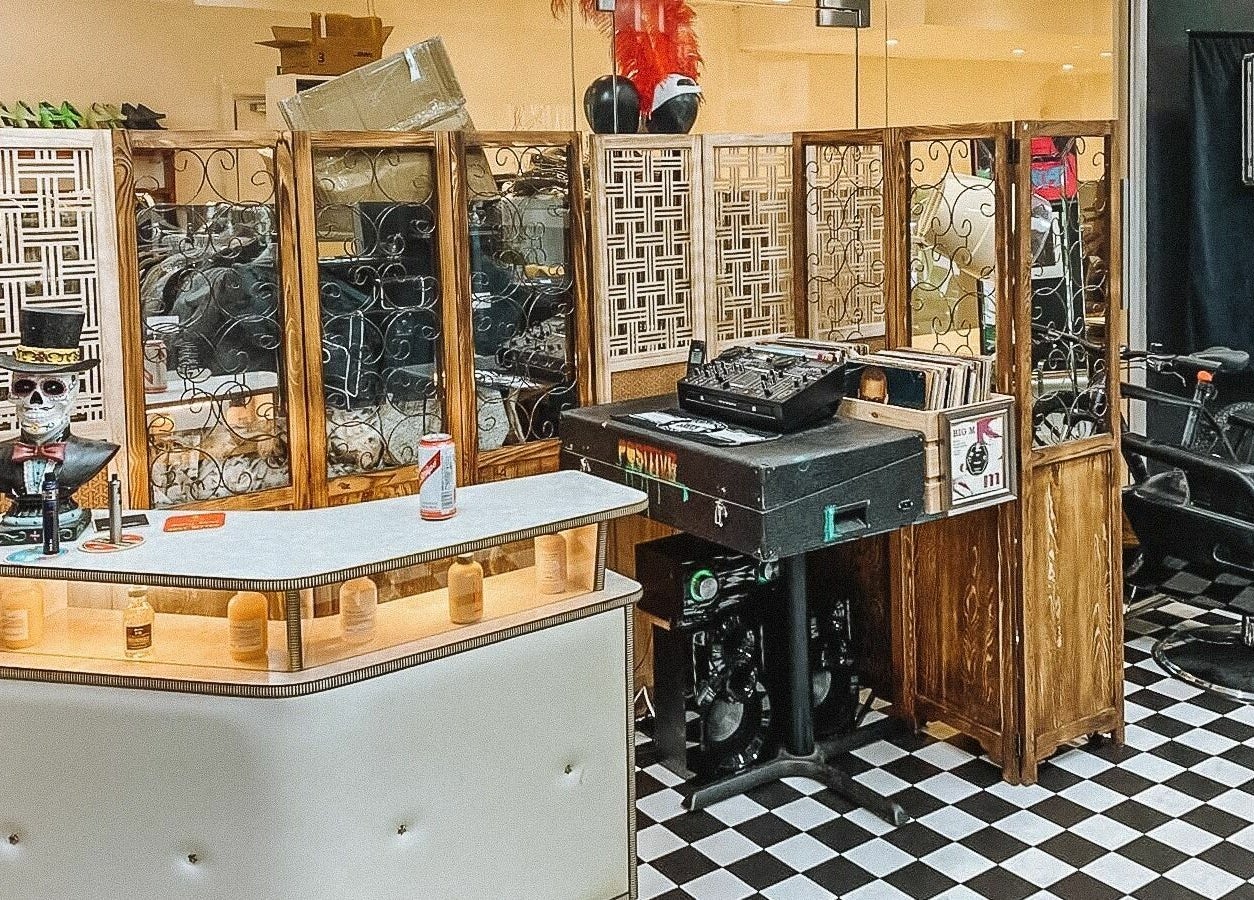 Stylish interior of Hackney Style Council, London, England, GB featuring unique decor and barber chair.