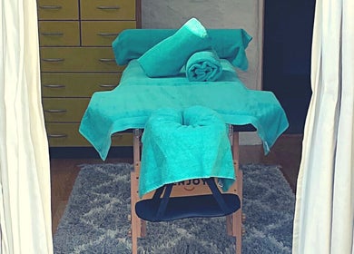 Massage table setup at Innovate4Life Massage Therapies, Plymouth, England, GB, ready for relaxation.