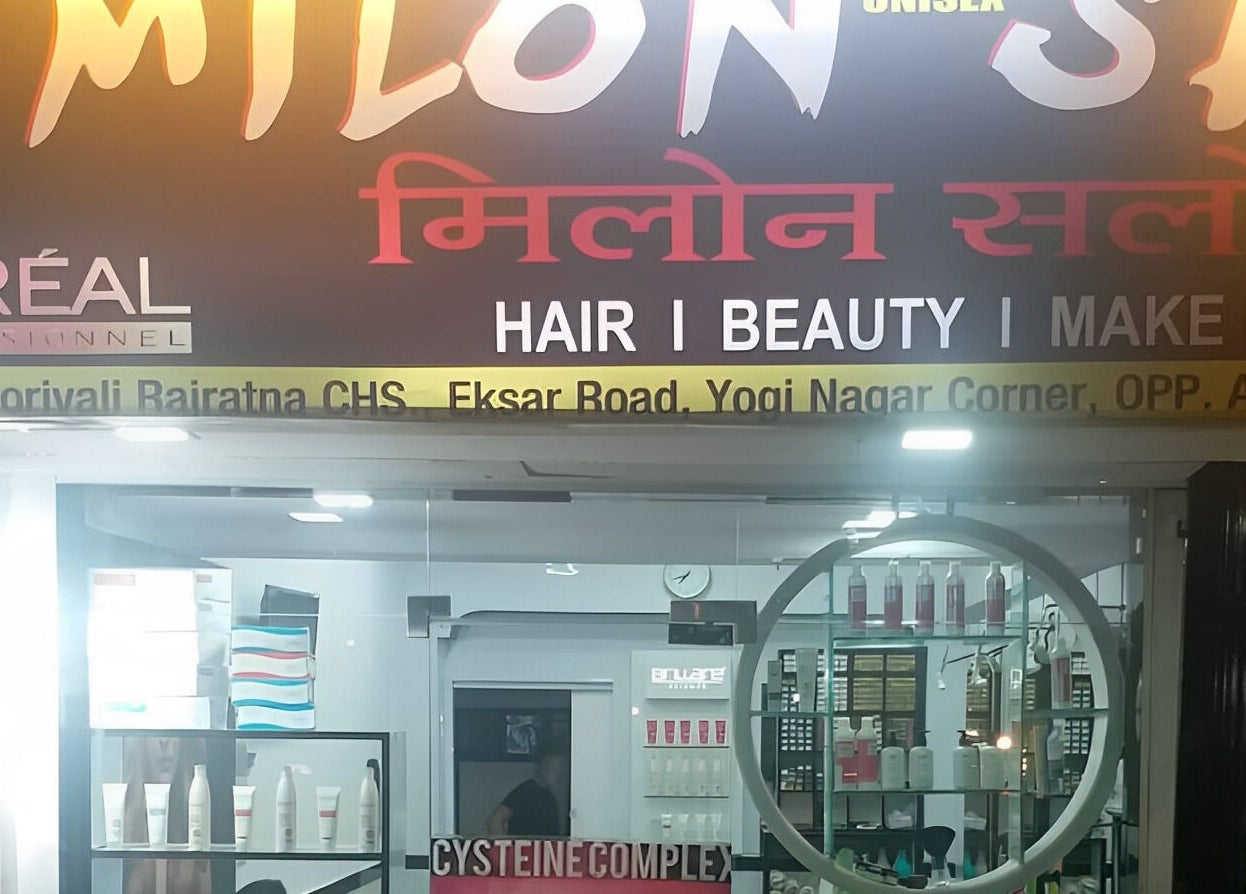 Entrance of Milon Salon in Mumbai, Maharashtra, IN showcasing beauty products and signage.