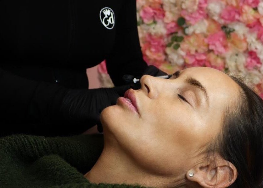 Client receives aesthetic procedure at Elladoons Aesthetics, Smallford, England, GB, enhancing her natural beauty.