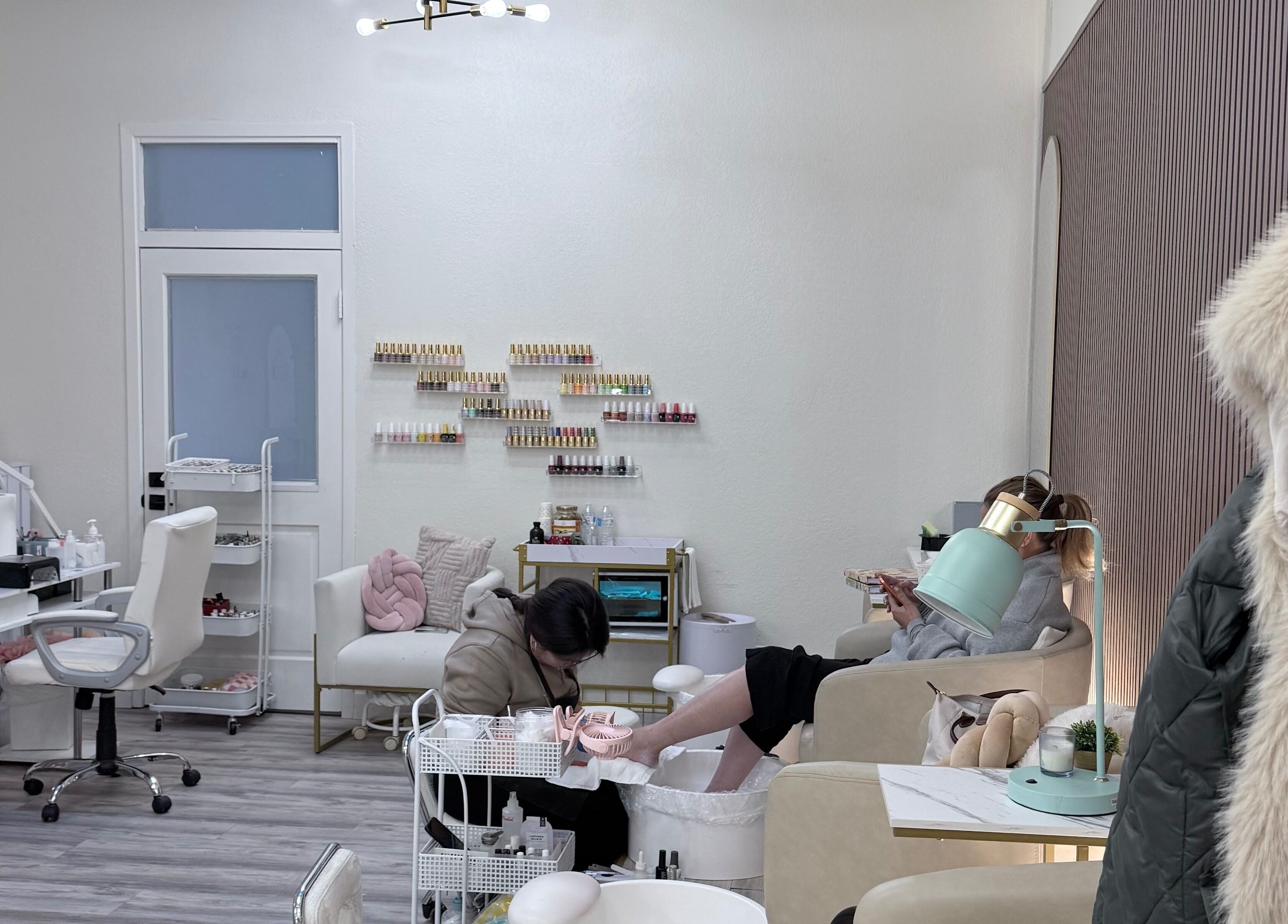 Interior of Me Nail Spa, Alameda, California with comfortable seating and a relaxing ambiance.
