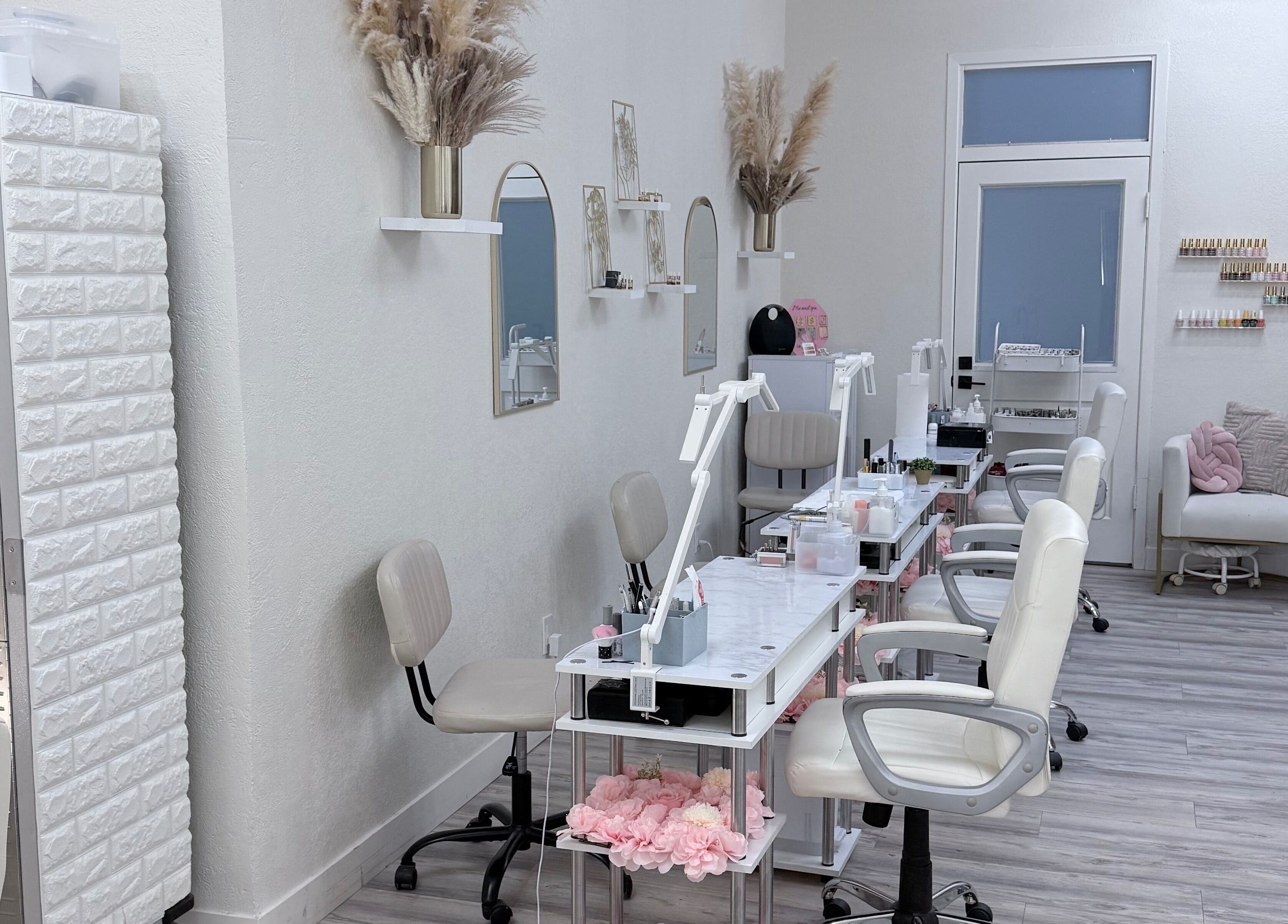 Elegant interior of Me Nail Spa in Alameda, California, US showcasing modern nail stations and decor.