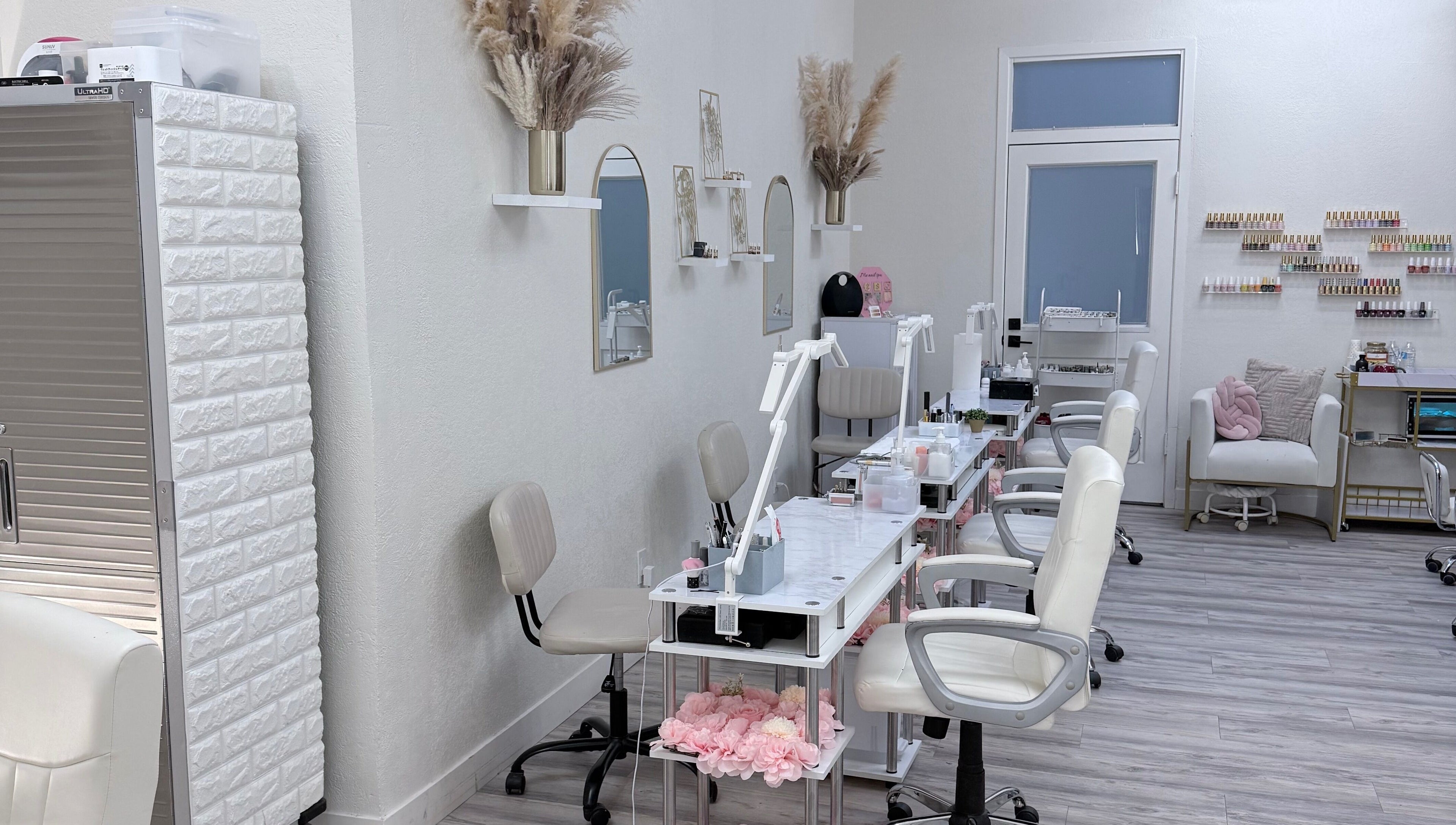 Sleek interior at Me Nail Spa, Alameda, California, US showcasing modern nail stations and elegant decor.
