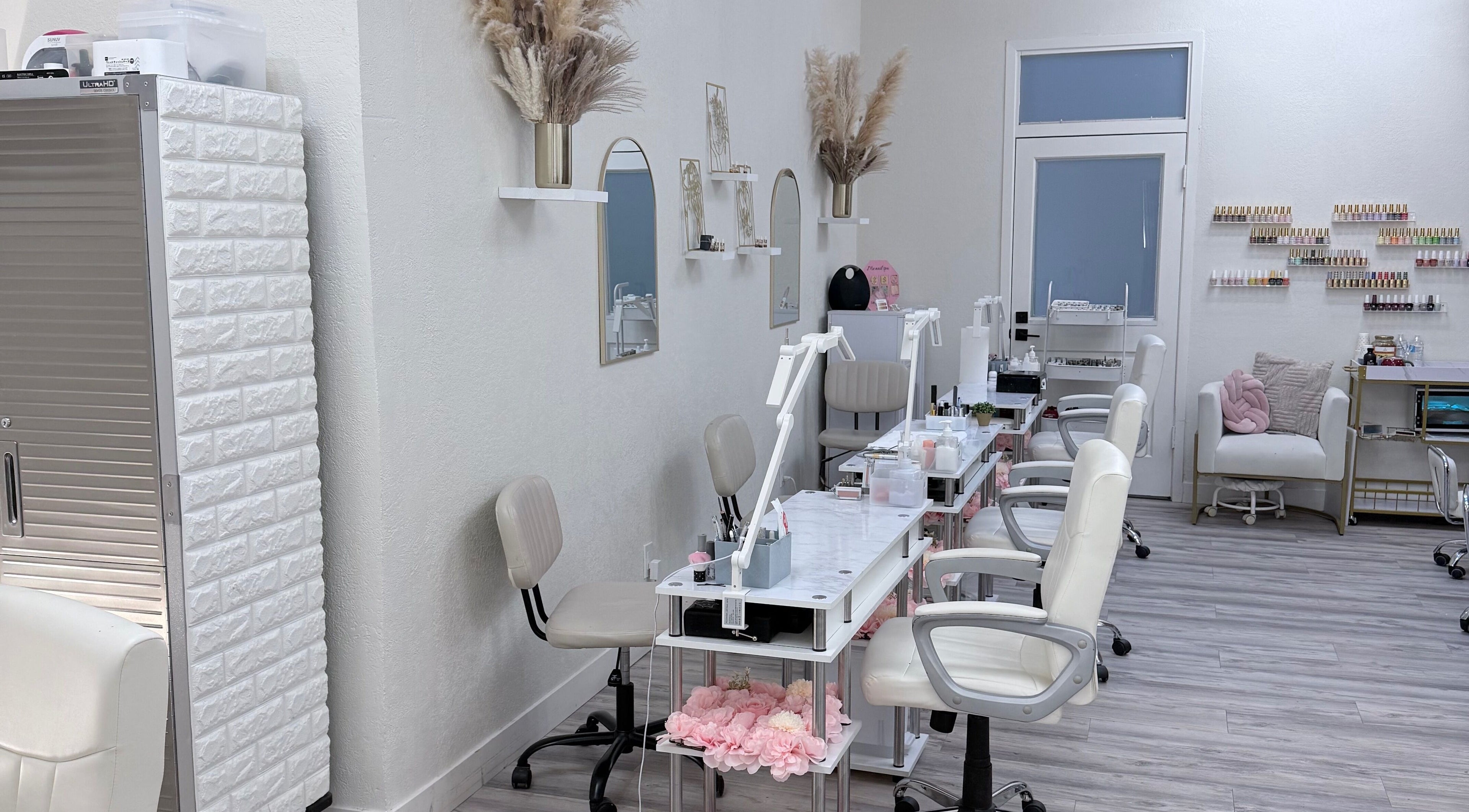 Sleek interior at Me Nail Spa, Alameda, California, US showcasing modern nail stations and elegant decor.