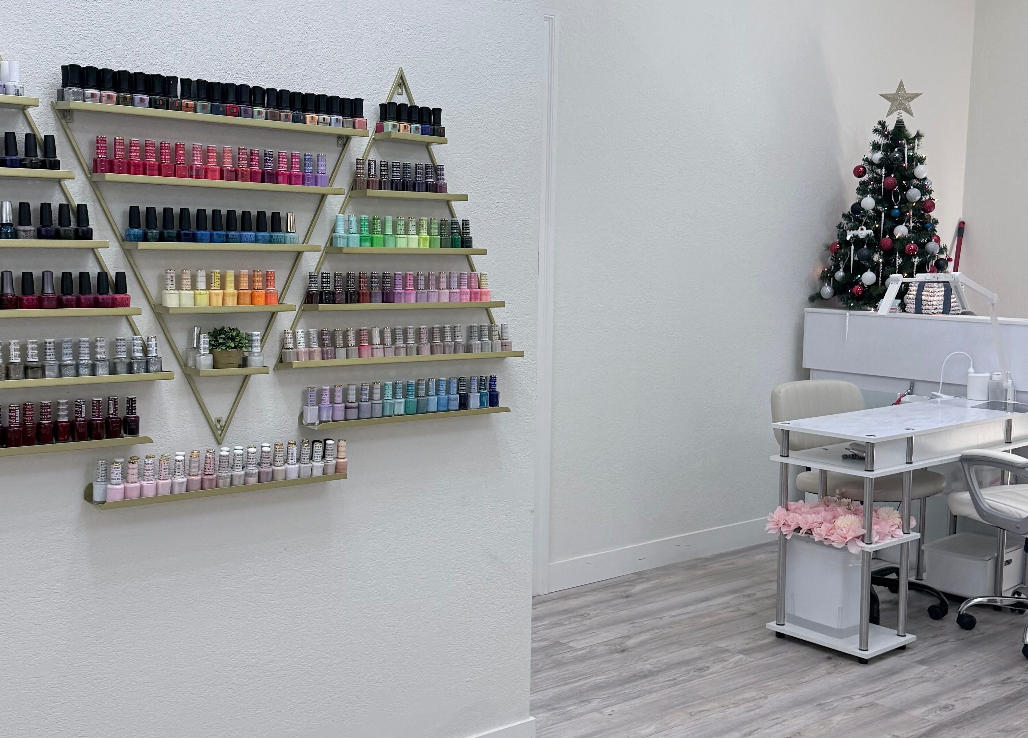 Elegant nail polish display and festive decor at Me Nail Spa, Alameda, California, US.