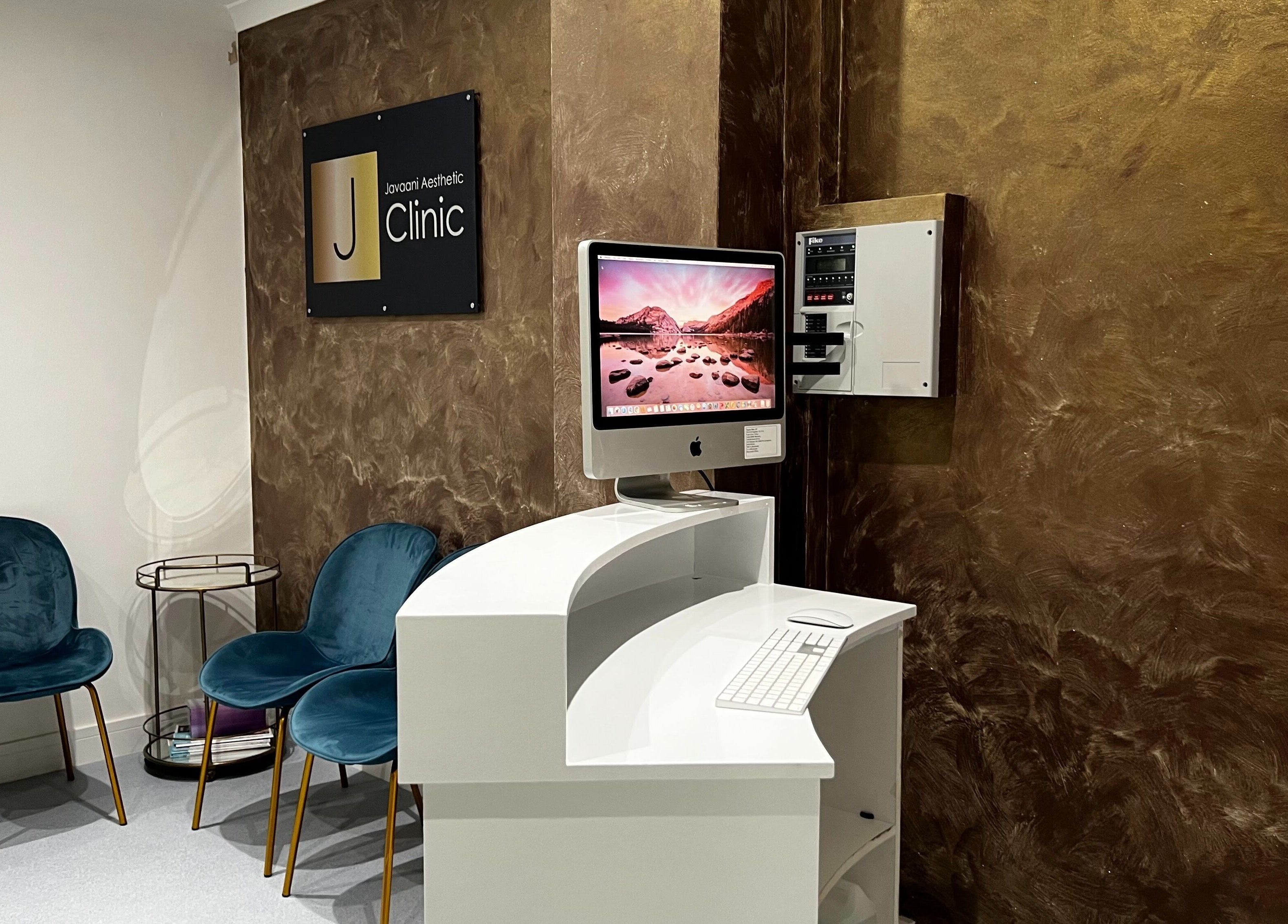 Reception area of Javaani Medical and Aesthetics in Hazlemere, England, GB, featuring modern decor and seating.