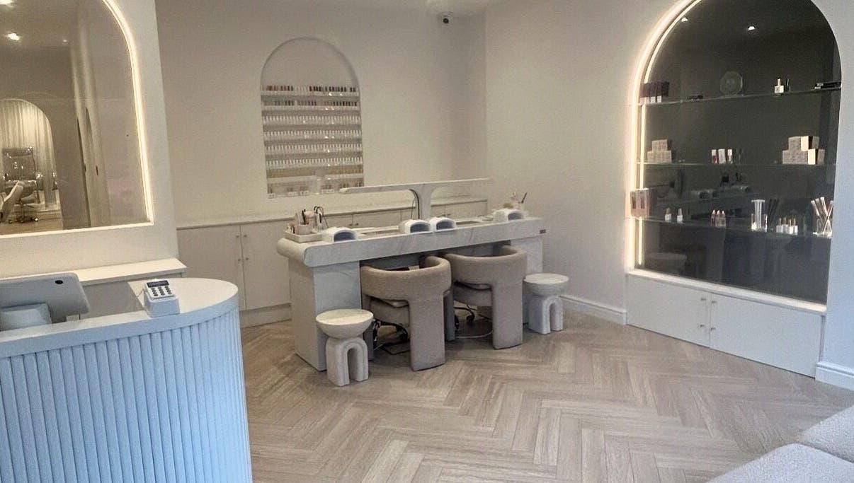 Elegant nail salon at Allure - Jesmond, Newcastle upon Tyne, England, GB with modern decor and cozy seating.
