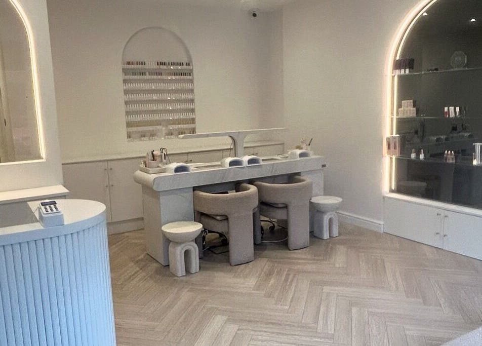 Elegant nail salon at Allure - Jesmond, Newcastle upon Tyne, England, GB with modern decor and cozy seating.