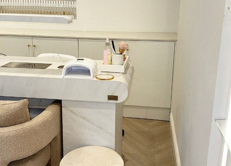 Modern nail station at Allure - Jesmond, Newcastle upon Tyne, England, GB with elegant design and equipment.