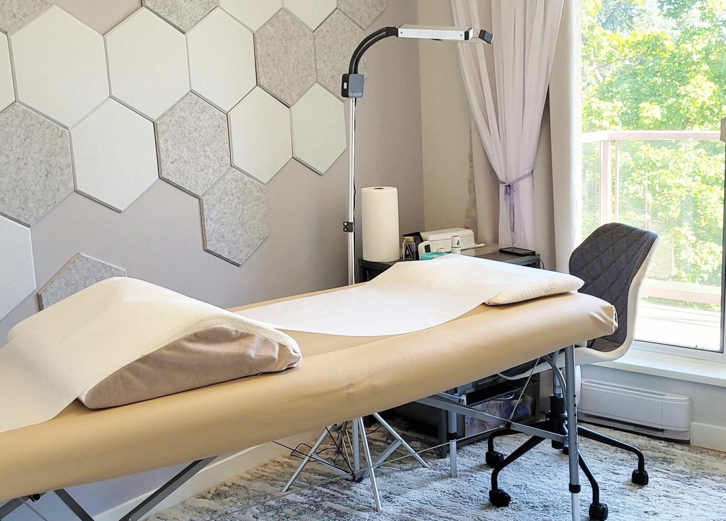 Tranquil wellness room at Ai-Lashes, Victoria, British Columbia, CA, featuring a comfortable treatment bed.