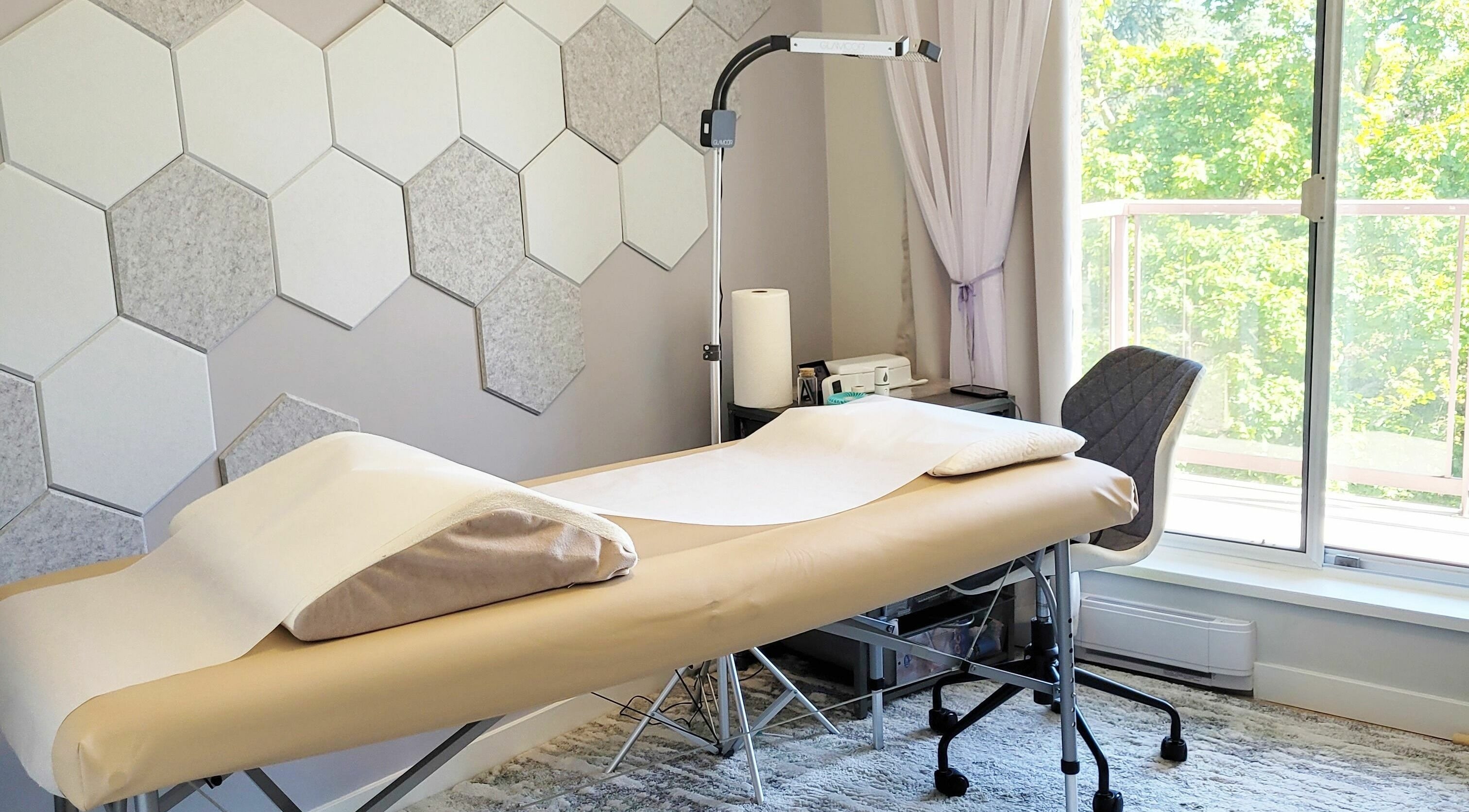 Tranquil wellness room at Ai-Lashes, Victoria, British Columbia, CA, featuring a comfortable treatment bed.