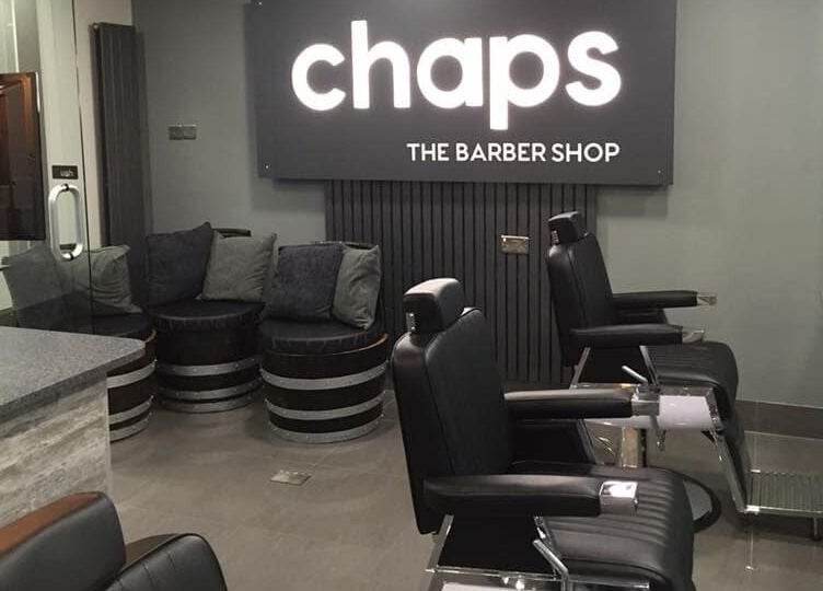 Interior of Chaps The Barbershop, modern chairs and decor in Edinburgh, Scotland, GB.
