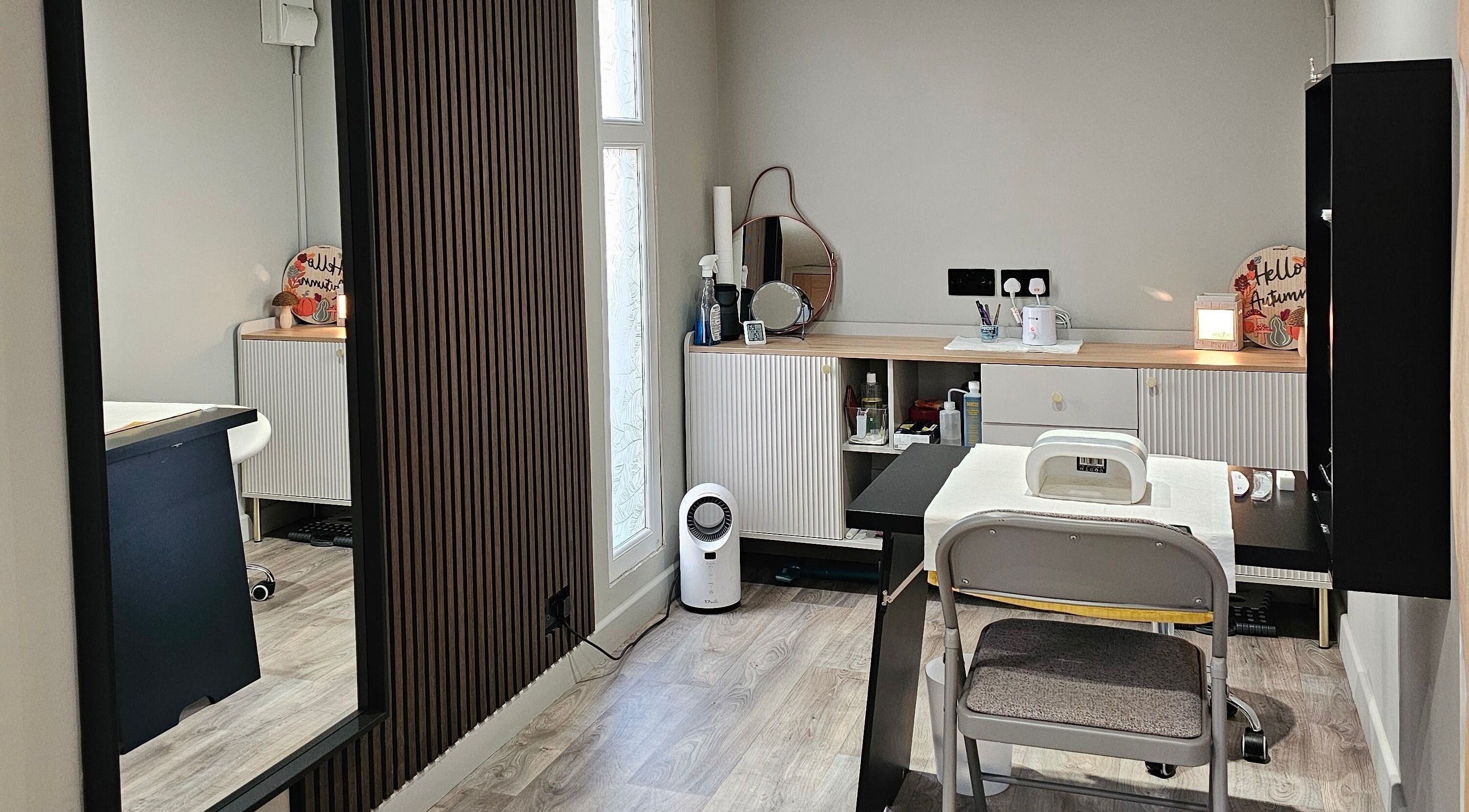 Chic interior of By Robyn in Cumbernauld, Scotland, GB, showcasing modern beauty treatment space.