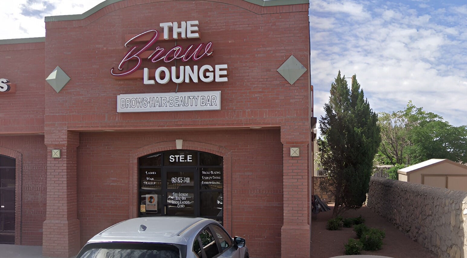 The Brow Lounge's brick exterior in El Paso, Texas welcomes guests for beauty services.