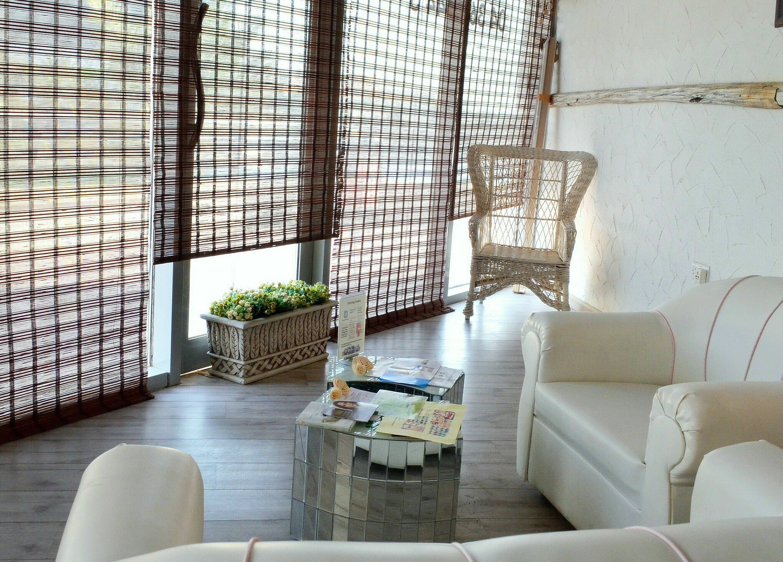 Relaxing lounge area at Naturopathy Touch Cluster D, Dubai, AE with comfortable seating and natural decor.