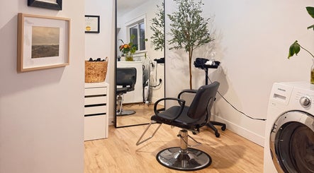 Elegant salon space at Jessica Blackmon - Hairstylist in Langley City, British Columbia, CA, featuring a sleek chair.