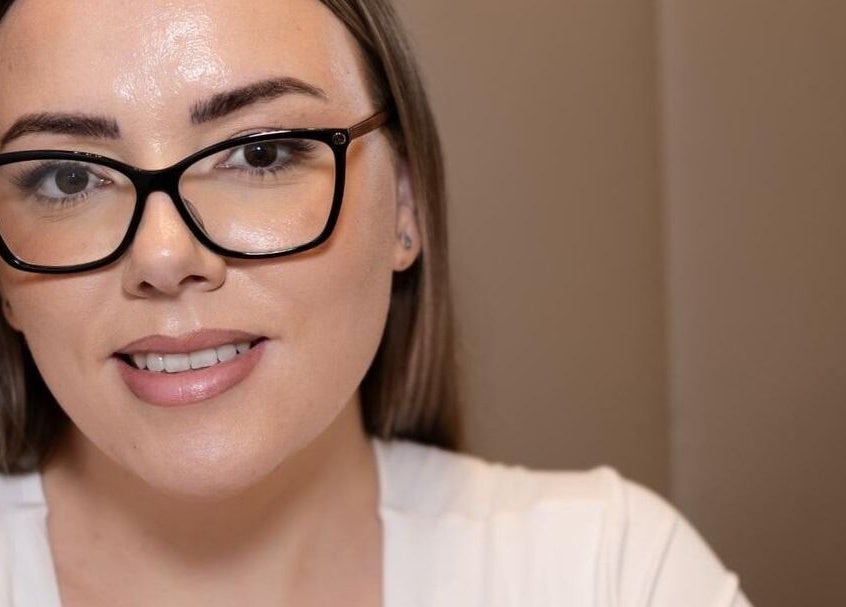 A welcoming smile at The Facialist Hampshire, Farleigh Wallop, England, GB, highlighting a modern beauty ambiance.