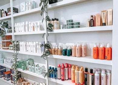 Product display at Katie Jones Hair in Windsor, Queensland, AU showcasing diverse hair care collections.