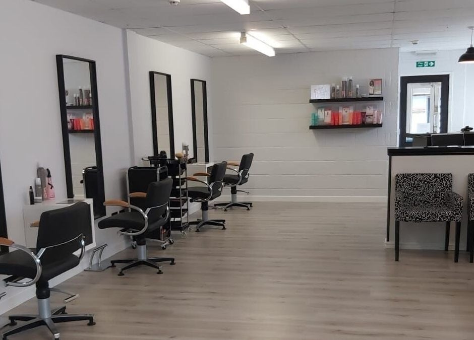 Modern interior of Salon 10 in Dalgety Bay, Scotland, GB with stylish chairs and decor.