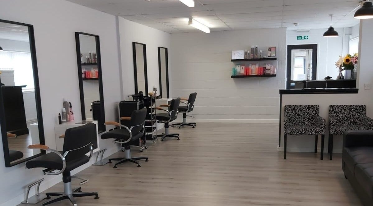 Modern interior of Salon 10 in Dalgety Bay, Scotland, GB with stylish chairs and decor.