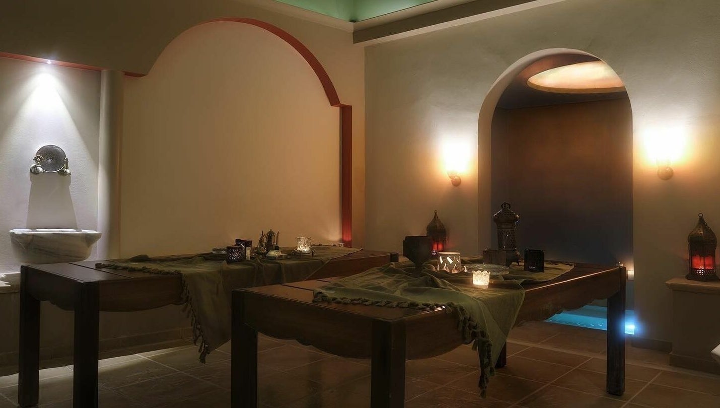 Luxurious spa room at Eressian Hammam and Spa, Ερεσός, GR, featuring massage tables and soft lighting.