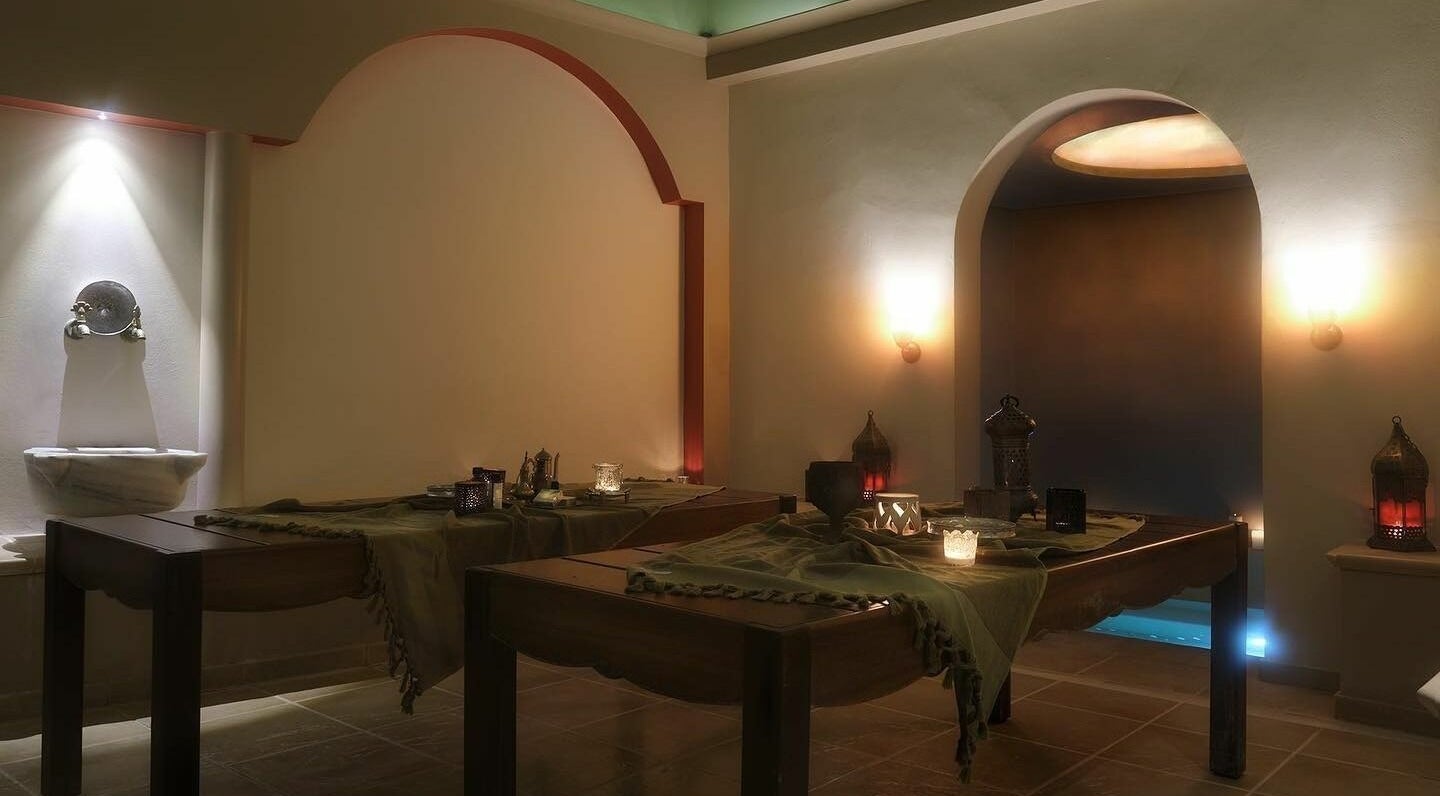 Luxurious spa room at Eressian Hammam and Spa, Ερεσός, GR, featuring massage tables and soft lighting.
