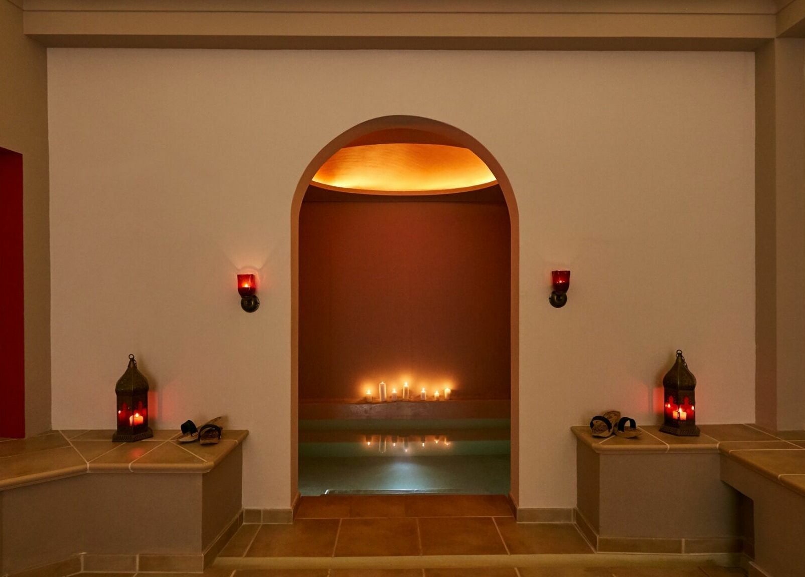 Serene candlelit room at Eressian Hammam and Spa, Ερεσός, GR, offering a tranquil wellness experience.