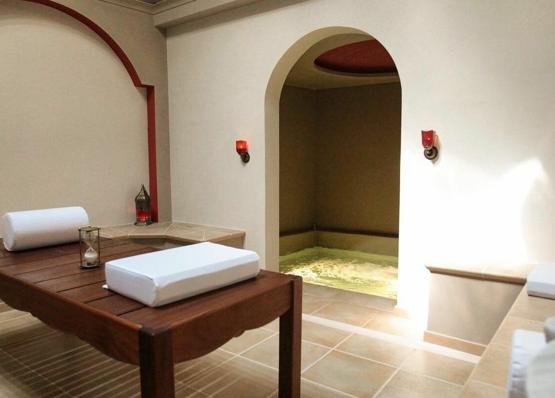 Cozy room at Eressian Hammam and Spa, Ερεσός, GR with elegant decor and relaxation area.