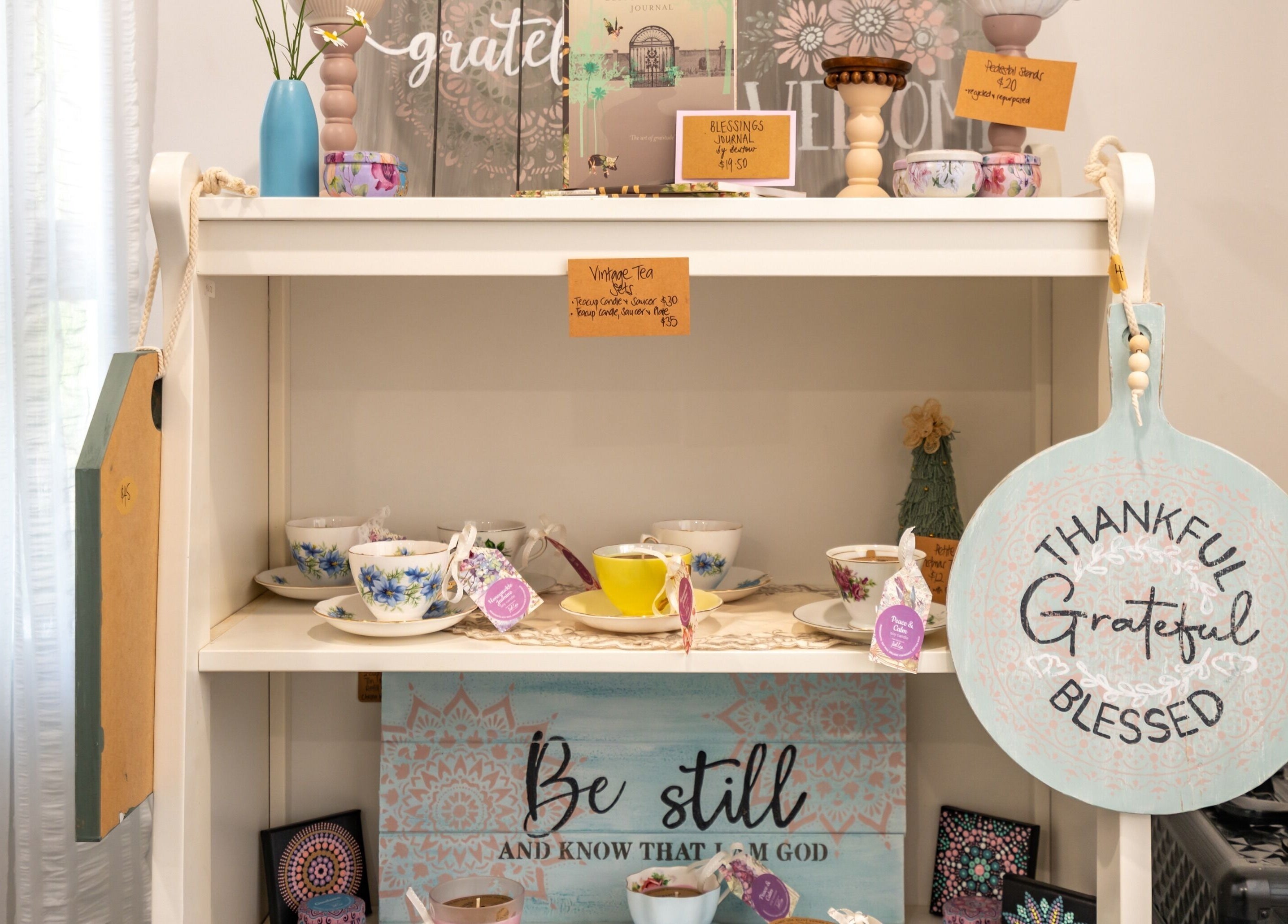 Chic vintage tea set display at Jodi Lea Natural Beauty in Auckland, Auckland, NZ, exuding a cozy, welcoming vibe.