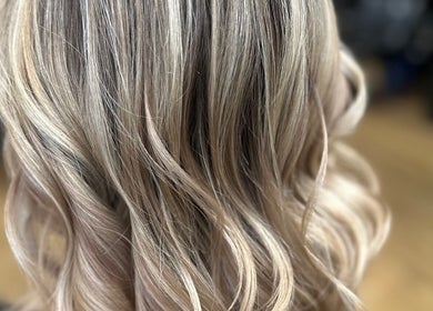 Soft blonde waves styled beautifully at Sally Hoo in Hagerstown, Maryland, US.