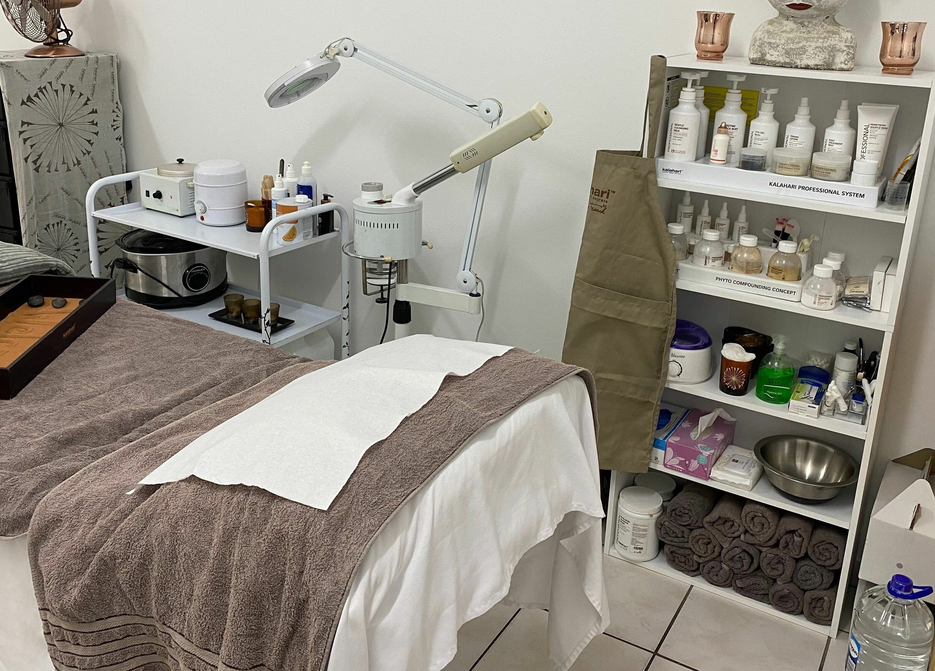 Cozy treatment room at Sublimity, Modimolle, Limpopo, ZA showcasing a massage table and skincare products.