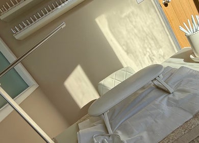 Clean and calming treatment area at Enhanced | Medical Aesthetics And Treatment Clinic in Newport, Wales, GB.