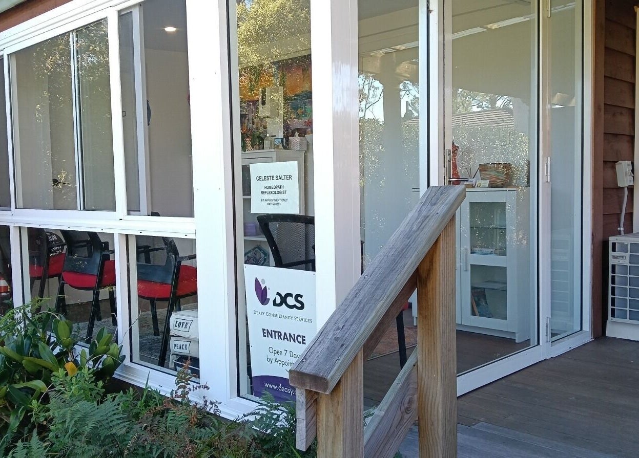 Entrance of Celeste Salter Faulconbridge Clinic with glass doors and garden, Faulconbridge, New South Wales, AU.