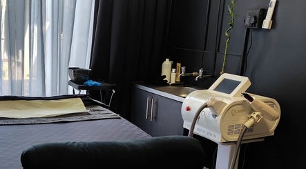Laser treatment room at Simplicity Beauty Clinic in Rustenburg, North West, ZA with modern equipment and serene decor.
