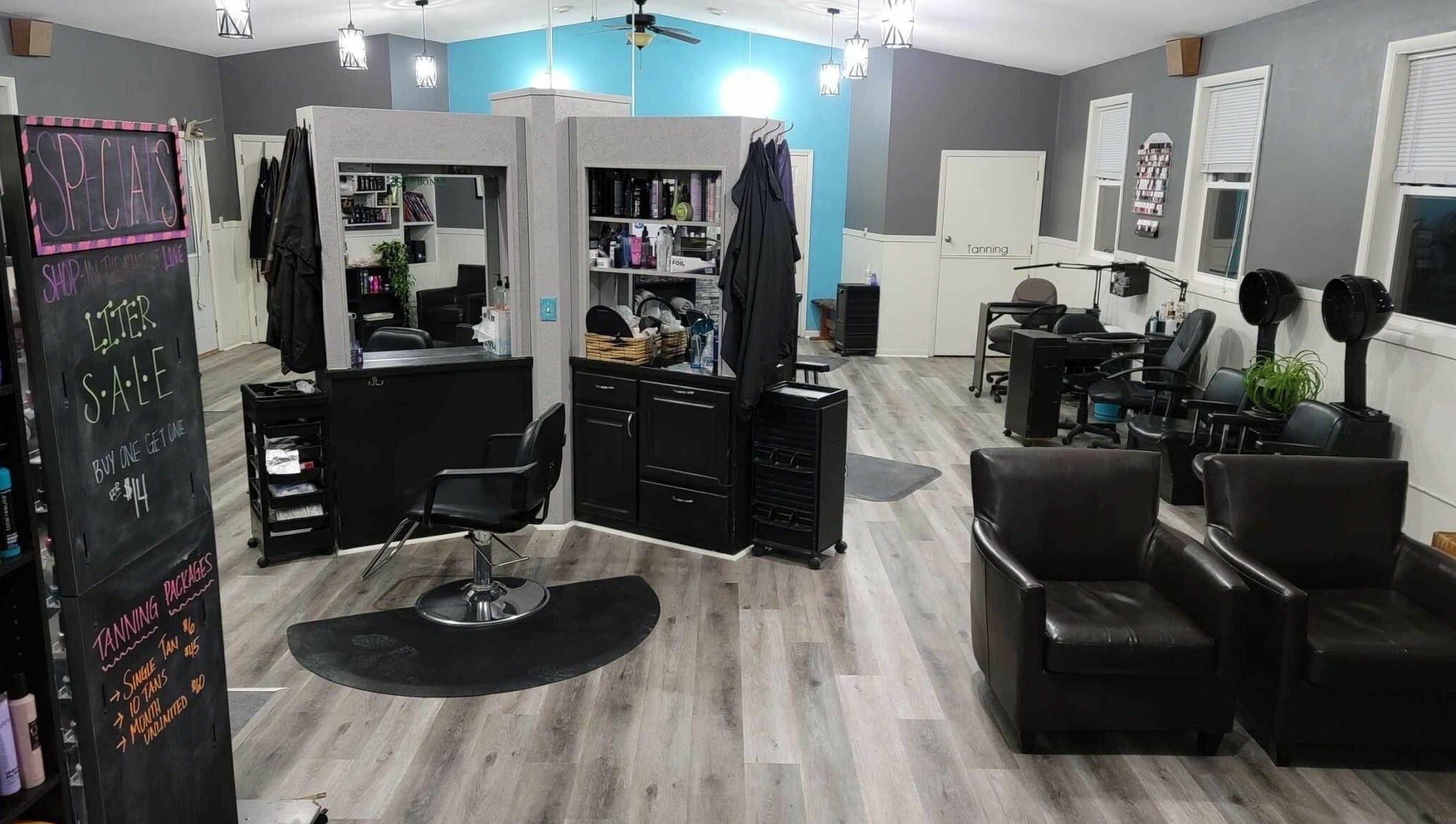 Cozy salon interior at Country Roots in Stockton, Illinois, US, highlighting stylish decor and seating area.