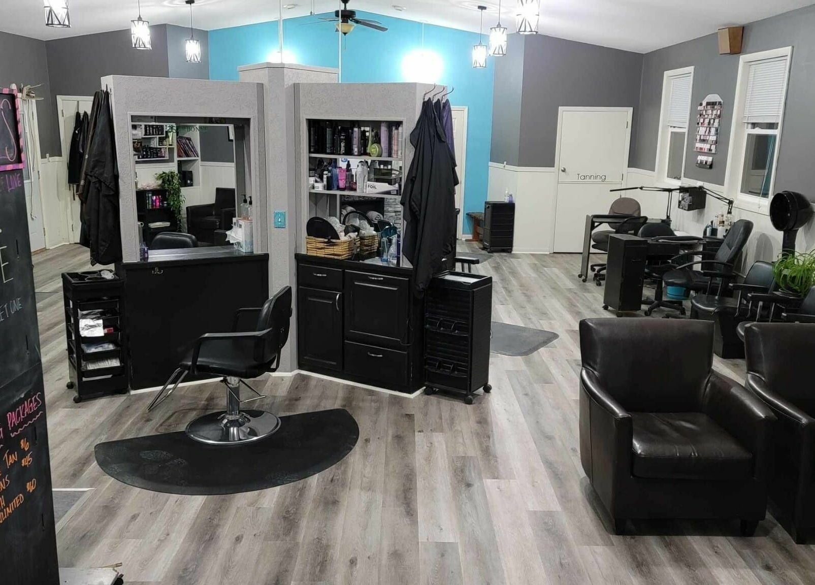 Cozy salon interior at Country Roots in Stockton, Illinois, US, highlighting stylish decor and seating area.