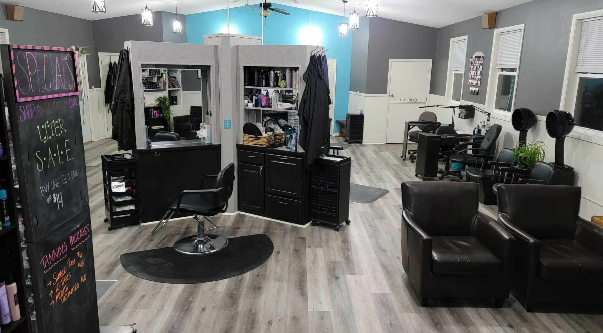 Cozy salon interior at Country Roots in Stockton, Illinois, US, highlighting stylish decor and seating area.