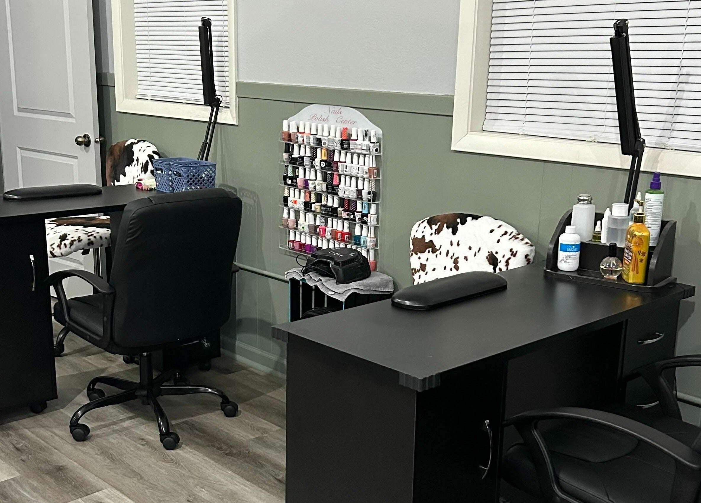 Sleek nail station at Country Roots in Stockton, Illinois, US. Features modern design with nail polish display.