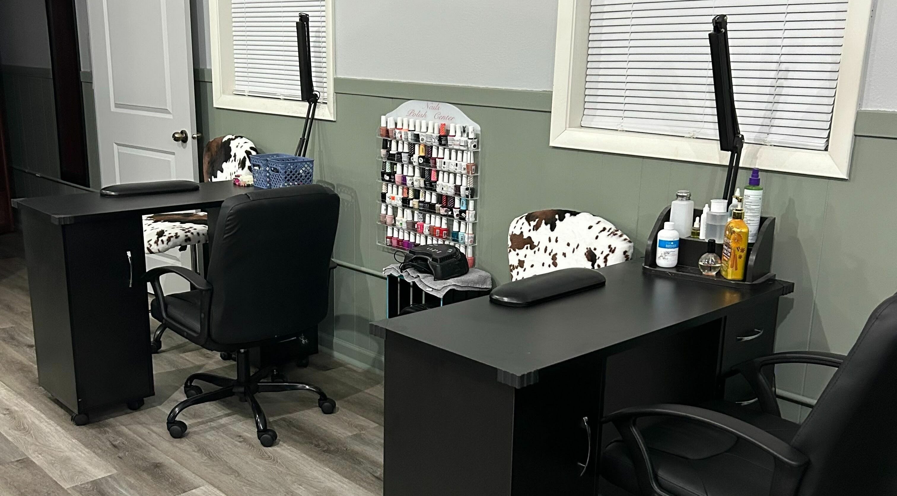 Sleek nail station at Country Roots in Stockton, Illinois, US. Features modern design with nail polish display.