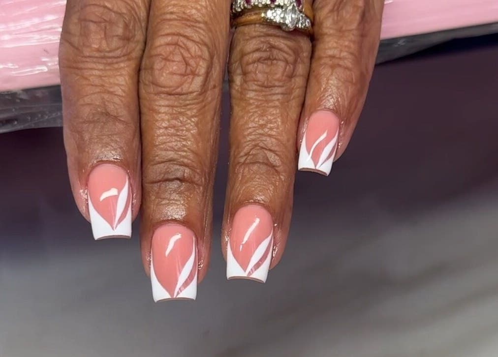 Chic pink and white nail design at SM Beauty Bar & Spa, Maynards, Saint Peter, BB.